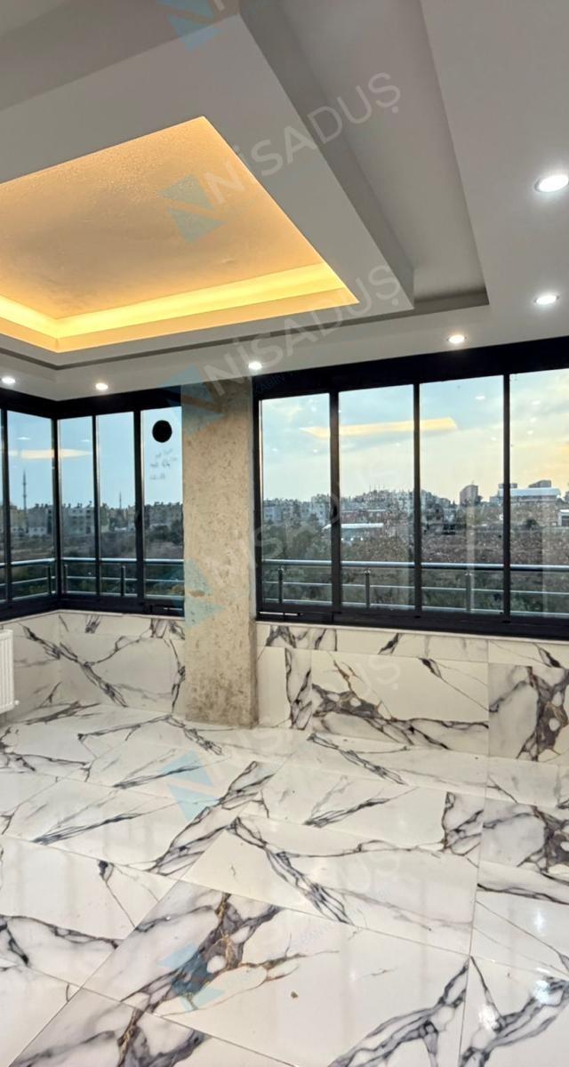Titanyum Isıcamlı Katlanır Sistem Cam Balkon